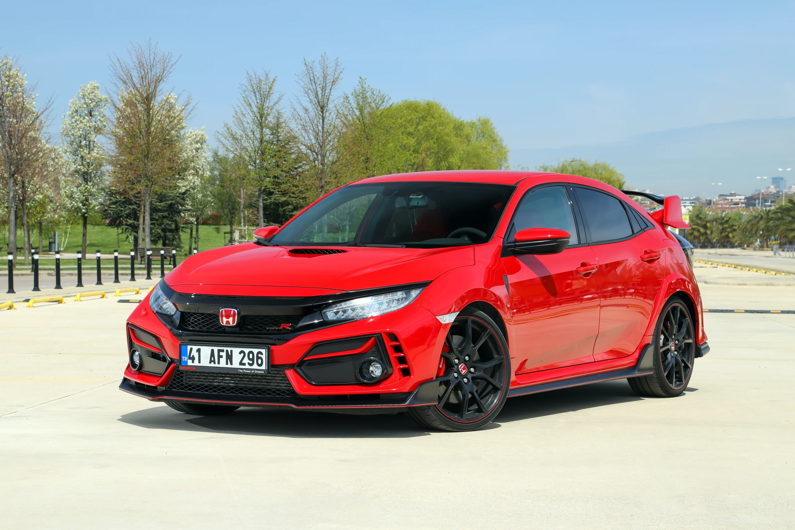 Asian auto repair services can enhance the performance of a vibrant red sports car